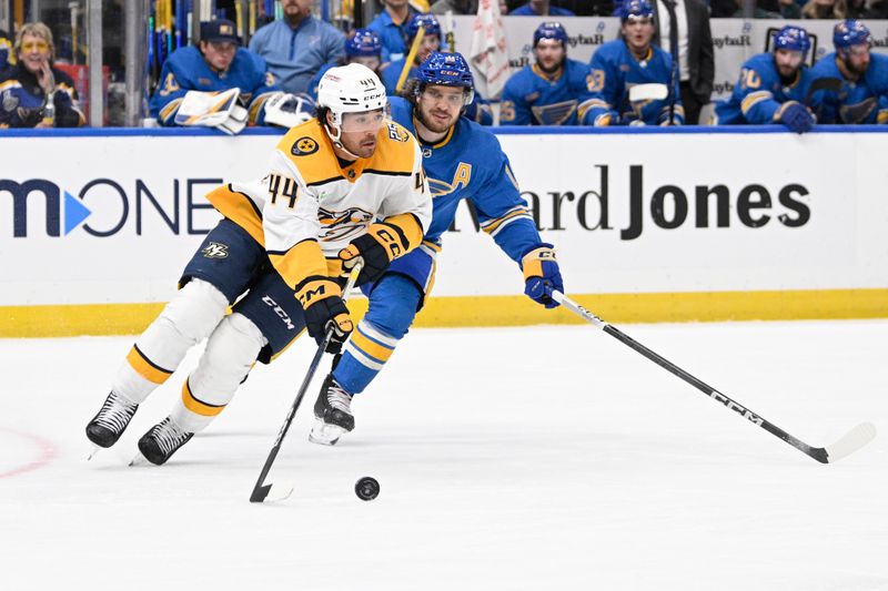 Feb 17, 2024; St. Louis, Missouri, USA; Nashville Predators left wing Kiefer Sherwood (44) contols the puck from St. Louis Blues center Robert Thomas (18) during the second period at Enterprise Center. Mandatory Credit: Jeff Le-USA TODAY Sports