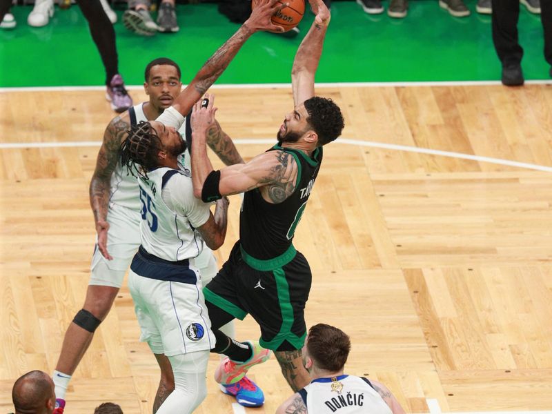 BOSTON, MA - JUNE 9: Derrick Jones Jr. #55 of the Dallas Mavericks blocks Jayson Tatum #0 of the Boston Celtics shot during the game during Game 2 of the 2024 NBA Finals on June 9, 2024 at the TD Garden in Boston, Massachusetts. NOTE TO USER: User expressly acknowledges and agrees that, by downloading and or using this photograph, User is consenting to the terms and conditions of the Getty Images License Agreement. Mandatory Copyright Notice: Copyright 2024 NBAE  (Photo by Chris Marion/NBAE via Getty Images)