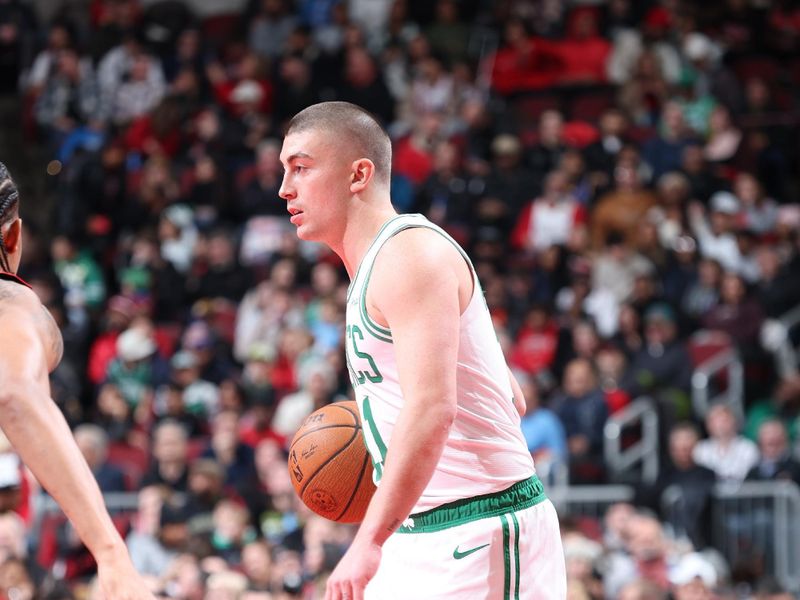 CHICAGO, IL - NOVEMBER 29: Payton Pritchard #11 of the Boston Celtics dribbles the ball during the game against the Chicago Bulls during the Emirates NBA Cup game on November 29, 2024 at United Center in Chicago, Illinois. NOTE TO USER: User expressly acknowledges and agrees that, by downloading and or using this photograph, User is consenting to the terms and conditions of the Getty Images License Agreement. Mandatory Copyright Notice: Copyright 2024 NBAE (Photo by Jeff Haynes/NBAE via Getty Images)