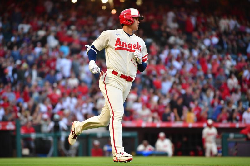 Jul 1, 2023; Anaheim, California, USA; Los Angeles Angels designated hitter Shohei Ohtani (17) runs out a fly ball against the Arizona Diamondbacks during the first inning at Angel Stadium. Mandatory Credit: Gary A. Vasquez-USA TODAY Sports
