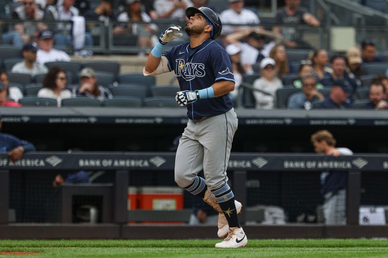 May 4, 2025; Bronx, New York, USA; Tampa Bay Rays first baseman Jonathan Aranda (62) reacts while winning the bases after his solo home run during the third inning against the New York Yankees at Yankee Stadium. Mandatory Credit: Vincent Carchietta-Imagn Images