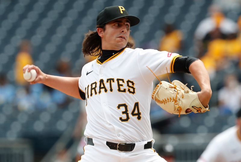 Jul 8, 2024; Pittsburgh, Pennsylvania, USA; Pittsburgh Pirates relief pitcher Brent Honeywell Jr. (34) throws against the New York Mets during the ninth inning at PNC Park.  The Pirates won 8-2. Mandatory Credit: Charles LeClaire-USA TODAY Sports