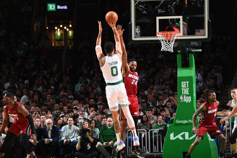 BOSTON, MA - APRIL 21: Jayson Tatum #0 of the Boston Celtics shoots a three point basket against the Miami Heat during Round 1 Game 1 of the 2024 NBA Playoffs on April 21, 2024 at the TD Garden in Boston, Massachusetts. NOTE TO USER: User expressly acknowledges and agrees that, by downloading and or using this photograph, User is consenting to the terms and conditions of the Getty Images License Agreement. Mandatory Copyright Notice: Copyright 2024 NBAE  (Photo by Brian Babineau/NBAE via Getty Images)