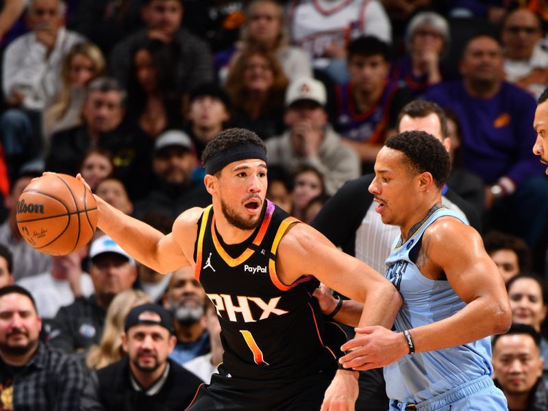 PHOENIX, AZ - FEBRUARY 11:  Devin Booker #1 of the Phoenix Suns dribbles the ball during the game against the Memphis Grizzlies on February 11, 2025 at Footprint Center in Phoenix, Arizona. NOTE TO USER: User expressly acknowledges and agrees that, by downloading and or using this photograph, user is consenting to the terms and conditions of the Getty Images License Agreement. Mandatory Copyright Notice: Copyright 2025 NBAE (Photo by Barry Gossage/NBAE via Getty Images)