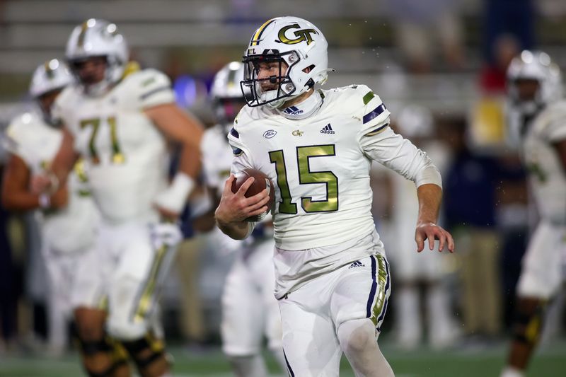 Nov 12, 2022; Atlanta, Georgia, USA; Georgia Tech Yellow Jackets quarterback Zach Gibson (15) runs the ball against the Miami Hurricanes in the second half at Bobby Dodd Stadium. Mandatory Credit: Brett Davis-USA TODAY Sports
