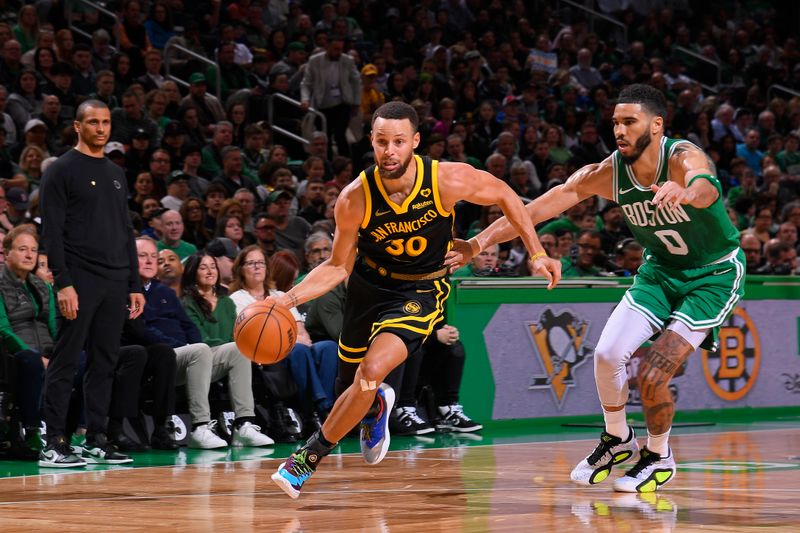 BOSTON, MA - MARCH 3: Stephen Curry #30 of the Golden State Warriors handles the ball during the game against the Boston Celtics on March 3, 2024 at the TD Garden in Boston, Massachusetts. NOTE TO USER: User expressly acknowledges and agrees that, by downloading and or using this photograph, User is consenting to the terms and conditions of the Getty Images License Agreement. Mandatory Copyright Notice: Copyright 2024 NBAE  (Photo by Brian Babineau/NBAE via Getty Images)