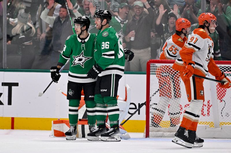 Nov 6, 2025; Dallas, Texas, USA; Dallas Stars center Wyatt Johnston (53) and right wing Mikko Rantanen (96) celebrate after Johnston scores a power play goal against the Anaheim Ducks during the first period at the American Airlines Center. Mandatory Credit: Jerome Miron-Imagn Images