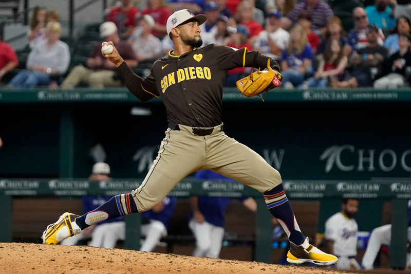 Jul 4, 2024; Arlington, Texas, USA; San Diego Padres pitcher Robert Suarez (75) throws to the plate during the ninth inning against the Texas Rangers at Globe Life Field. Mandatory Credit: Raymond Carlin III-USA TODAY Sports