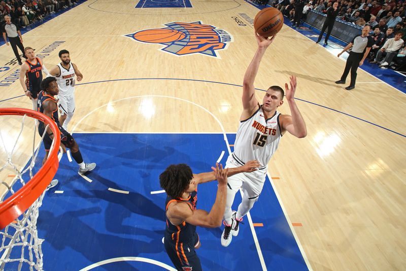 NEW YORK, NY - JANUARY 25: Nikola Jokic #15 of the Denver Nuggets shoots the ball during the game against the New York Knicks on January 25, 2024 at Madison Square Garden in New York City, New York.  NOTE TO USER: User expressly acknowledges and agrees that, by downloading and or using this photograph, User is consenting to the terms and conditions of the Getty Images License Agreement. Mandatory Copyright Notice: Copyright 2024 NBAE  (Photo by Nathaniel S. Butler/NBAE via Getty Images)