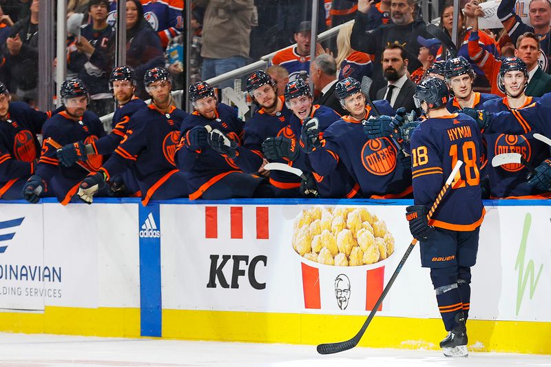 Jan 25, 2024; Edmonton, Alberta, CAN; The Edmonton Oilers celebrate a goal scored by forward Zach Hyman (18) during the third period against the Chicago Blackhawks at Rogers Place. Mandatory Credit: Perry Nelson-USA TODAY Sports