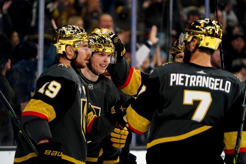 Mar 19, 2023; Las Vegas, Nevada, USA; Vegas Golden Knights left wing Pavel Dorofeyev (16) celebrates with teammates after scoring a goal during the second period against the Columbus Blue Jackets at T-Mobile Arena. Mandatory Credit: Lucas Peltier-USA TODAY Sports