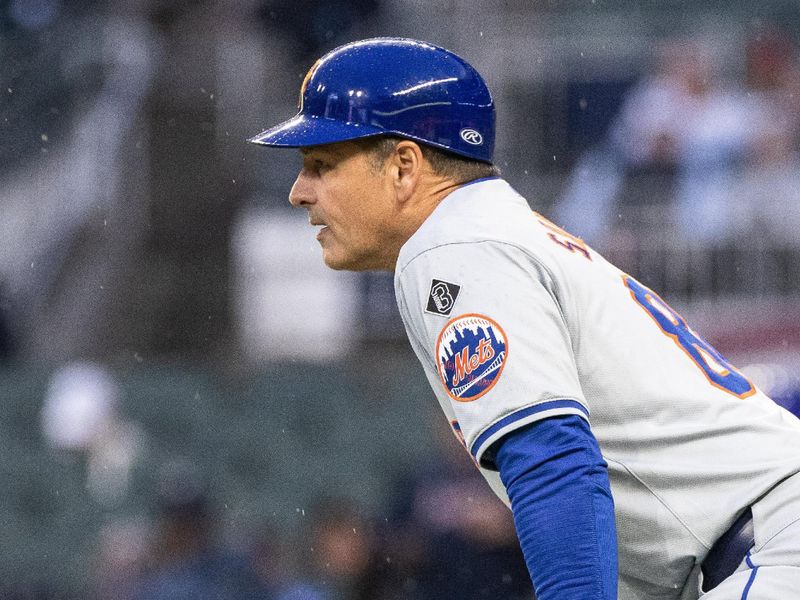 Apr 9, 2024; Cumberland, Georgia, USA; New York Mets third base coach Mike Sarbaugh (88) in the game against Atlanta Braves during the second inning at Truist Park. Mandatory Credit: Jordan Godfree-USA TODAY Sports