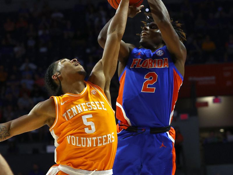 Feb 1, 2023; Gainesville, Florida, USA; Tennessee Volunteers guard Zakai Zeigler (5) defends Florida Gators guard Trey Bonham (2) during the first half at Exactech Arena at the Stephen C. O'Connell Center. Mandatory Credit: Kim Klement-USA TODAY Sports