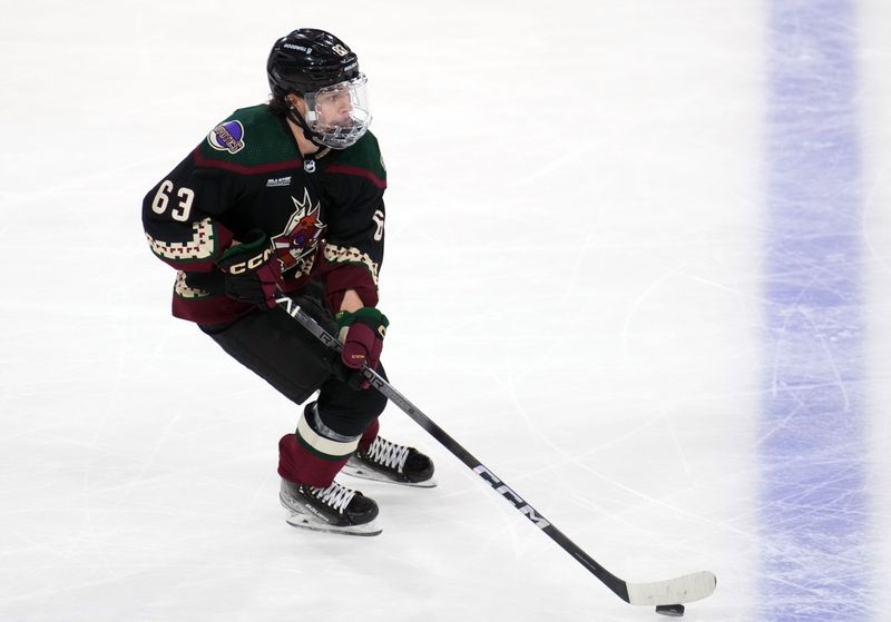 Dec 7, 2023; Tempe, Arizona, USA; Arizona Coyotes left wing Matias Maccelli (63) skates against the Philadelphia Flyers during the third period at Mullett Arena. Mandatory Credit: Joe Camporeale-USA TODAY Sports