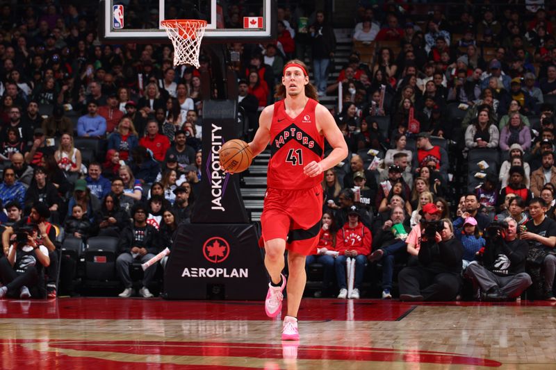 TORONTO, CANADA - MARCH 31: Kelly Olynyk #41 of the Toronto Raptor dribbles the ball during the game against the Philadelphia 76ers on March 31, 2024 at the Scotiabank Arena in Toronto, Ontario, Canada.  NOTE TO USER: User expressly acknowledges and agrees that, by downloading and or using this Photograph, user is consenting to the terms and conditions of the Getty Images License Agreement.  Mandatory Copyright Notice: Copyright 2024 NBAE (Photo by Vaughn Ridley/NBAE via Getty Images)