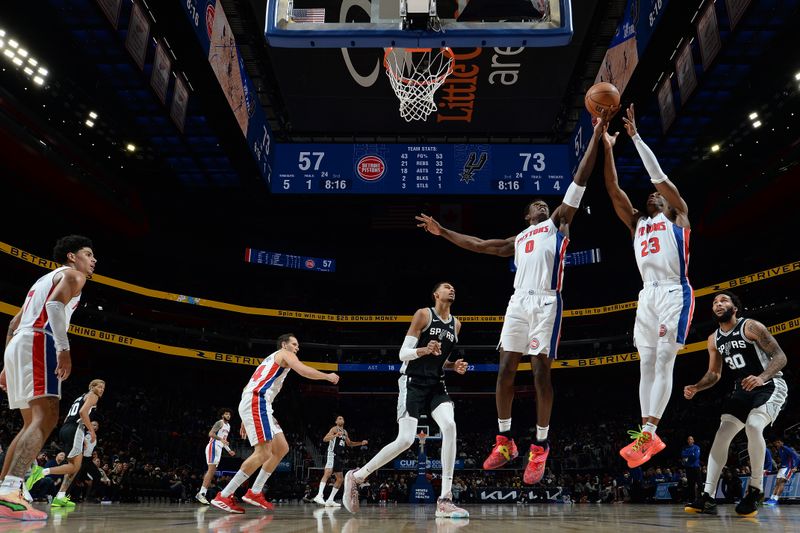 DETROIT, MI - JANUARY 10: Jalen Duren #0 and Jaden Ivey #23 of the Detroit Pistons go for a rebound during the game against the San Antonio Spurs on January 10, 2024 at Little Caesars Arena in Detroit, Michigan. NOTE TO USER: User expressly acknowledges and agrees that, by downloading and/or using this photograph, User is consenting to the terms and conditions of the Getty Images License Agreement. Mandatory Copyright Notice: Copyright 2024 NBAE (Photo by Chris Schwegler/NBAE via Getty Images)