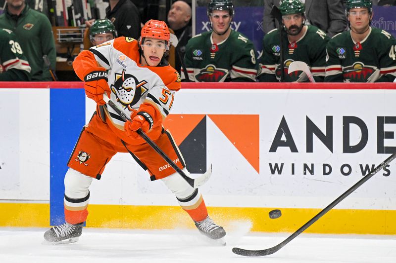 Nov 15, 2025; Saint Paul, Minnesota, USA;  Anaheim Ducks defensemen Olen Zellweger (51) makes a pass against the Minnesota Wild during the first period at Grand Casino Arena. Mandatory Credit: Nick Wosika-Imagn Images