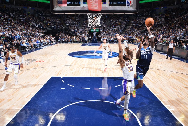MINNEAPOLIS, MN -  APRIL 27: Naz Reid #11 of the Minnesota Timberwolves drives to the basket during the game against the Los Angeles Lakers during Round 1 Game 4 of the 2025 NBA Playoffs on April 27, 2025 at Target Center in Minneapolis, Minnesota. NOTE TO USER: User expressly acknowledges and agrees that, by downloading and or using this Photograph, user is consenting to the terms and conditions of the Getty Images License Agreement. Mandatory Copyright Notice: Copyright 2025 NBAE (Photo by Barry Gossage/NBAE via Getty Images)