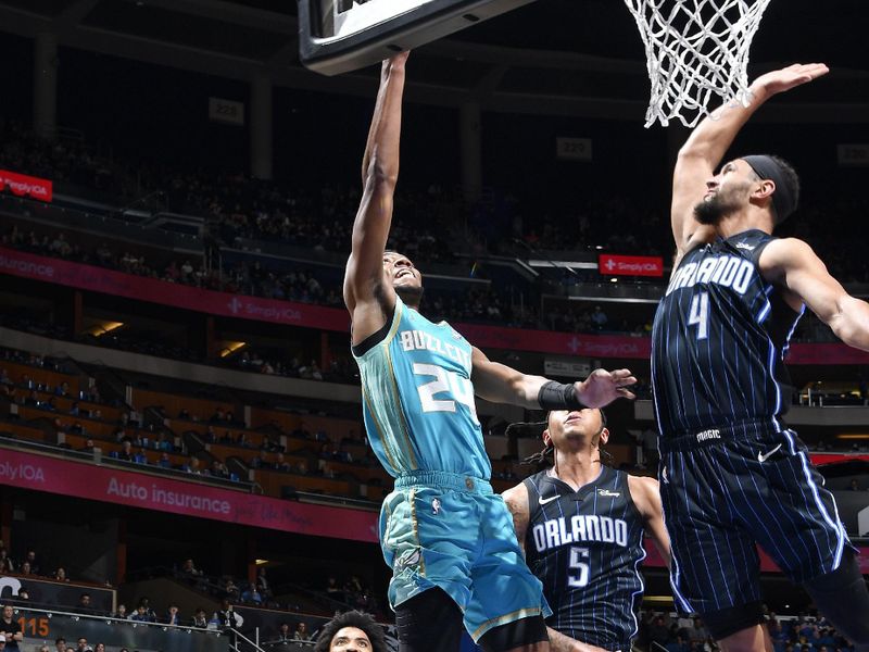 ORLANDO, FL - MARCH 19: Brandon Miller #24 of the Charlotte Hornets drives to the basket during the game against the Orlando Magic on March 19, 2024 at the Kia Center in Orlando, Florida. NOTE TO USER: User expressly acknowledges and agrees that, by downloading and or using this photograph, User is consenting to the terms and conditions of the Getty Images License Agreement. Mandatory Copyright Notice: Copyright 2024 NBAE (Photo by Fernando Medina/NBAE via Getty Images)