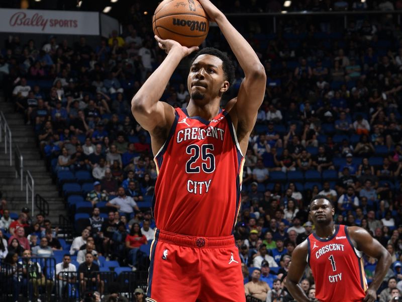 ORLANDO, FL - MARCH 21: Trey Murphy III #25 of the New Orleans Pelicans shoots a free throw during the game against the Orlando Magic on March 21, 2024 at Amway Center in Orlando, Florida. NOTE TO USER: User expressly acknowledges and agrees that, by downloading and or using this photograph, User is consenting to the terms and conditions of the Getty Images License Agreement. Mandatory Copyright Notice: Copyright 2024 NBAE (Photo by Fernando Medina/NBAE via Getty Images)