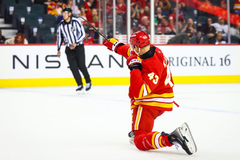 Sep 28, 2024; Calgary, Alberta, CAN; Calgary Flames right wing Adam Klapka (43) celebrates his goal against the Vancouver Canucks during the second period at Scotiabank Saddledome. Mandatory Credit: Sergei Belski-Imagn Images