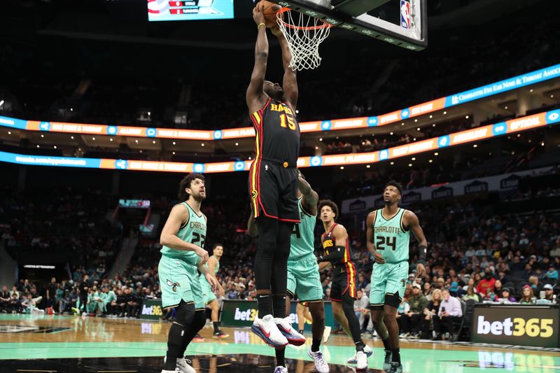 CHARLOTTE, NC - NOVEMBER 30: Clint Capela #15 of the Atlanta Hawks dunks the ball during the game against the Charlotte Hornets on November 30, 2024 at Spectrum Center in Charlotte, North Carolina. NOTE TO USER: User expressly acknowledges and agrees that, by downloading and or using this photograph, User is consenting to the terms and conditions of the Getty Images License Agreement. Mandatory Copyright Notice: Copyright 2024 NBAE (Photo by Brock Williams-Smith/NBAE via Getty Images)