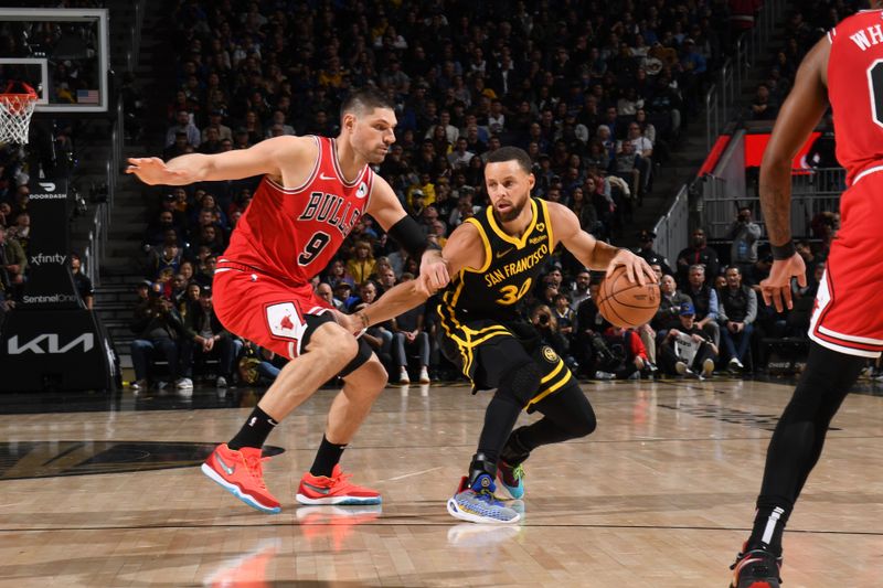 SAN FRANCISCO, CA - MARCH 7:  Stephen Curry #30 of the Golden State Warriors handles the ball during the game against the Chicago Bulls on March 7, 2024 at Chase Center in San Francisco, California. NOTE TO USER: User expressly acknowledges and agrees that, by downloading and or using this photograph, user is consenting to the terms and conditions of Getty Images License Agreement. Mandatory Copyright Notice: Copyright 2024 NBAE (Photo by Noah Graham/NBAE via Getty Images)