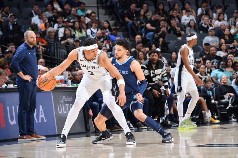 SAN ANTONIO, TX - MARCH 22  Keldon Johnson #3 of the San Antonio Spurs handles the ball during the game against the Memphis Grizzlies on March 22, 2024 at the Frost Bank Center in San Antonio, Texas. NOTE TO USER: User expressly acknowledges and agrees that, by downloading and or using this photograph, user is consenting to the terms and conditions of the Getty Images License Agreement. Mandatory Copyright Notice: Copyright 2024 NBAE (Photos by Michael Gonzales/NBAE via Getty Images)