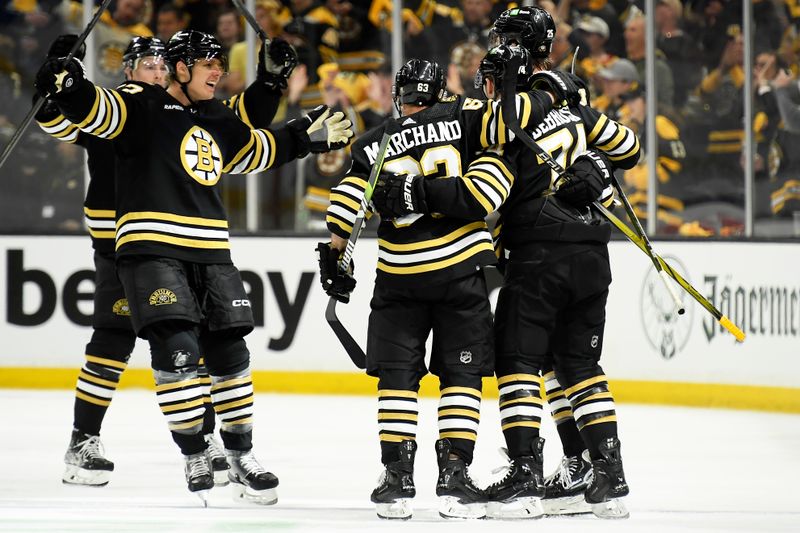 Apr 20, 2024; Boston, Massachusetts, USA; The Boston Bruins celebrate a goal during the second period in game one of the first round of the 2024 Stanley Cup Playoffs against the Toronto Maple Leafs at TD Garden. Mandatory Credit: Bob DeChiara-USA TODAY Sports