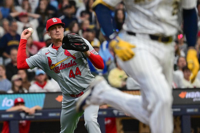 May 11, 2024; Milwaukee, Wisconsin, USA; St. Louis Cardinals pitcher Kyle Gibson (44) throws to retire Milwaukee Brewers second baseman Brice Turang (2) in the third inning at American Family Field. Mandatory Credit: Benny Sieu-USA TODAY Sports