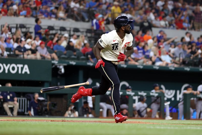 Sep 2, 2023; Arlington, Texas, USA; Texas Rangers right fielder Adolis Garcia (53) hits a two run home run against the Minnesota Twins in the first inning at Globe Life Field. Mandatory Credit: Tim Heitman-USA TODAY Sports