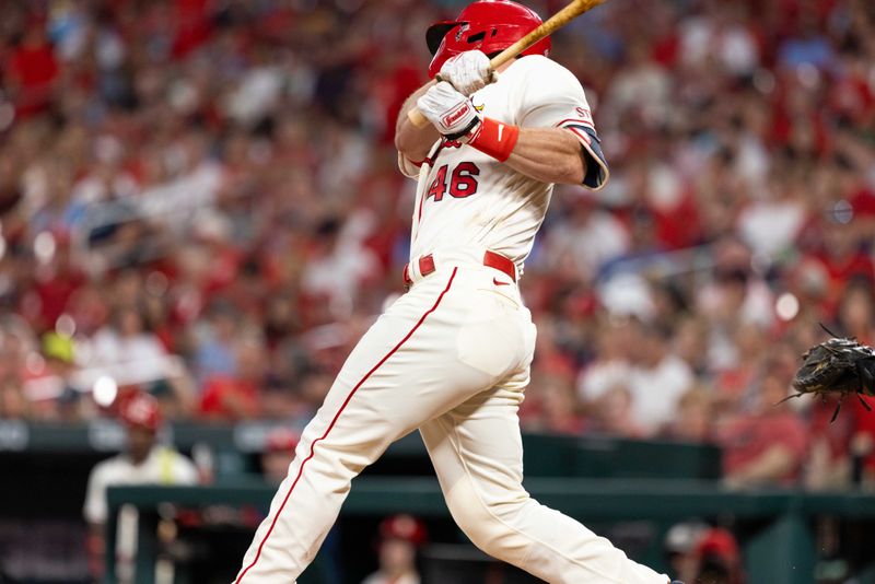 Sep 30, 2023; St. Louis, Missouri, USA; St. Louis Cardinals first baseman Paul Goldschmidt (46) hits a double in the second inning against the Cincinnati Reds at Busch Stadium. Mandatory Credit: Zach Dalin-USA TODAY Sports