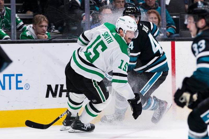 Mar 5, 2024; San Jose, California, USA; Dallas Stars center Craig Smith (15) and San Jose Sharks defenseman Marc-Edouard Vlasic (44) follow the puck during the first period at SAP Center at San Jose. Mandatory Credit: John Hefti-USA TODAY Sports