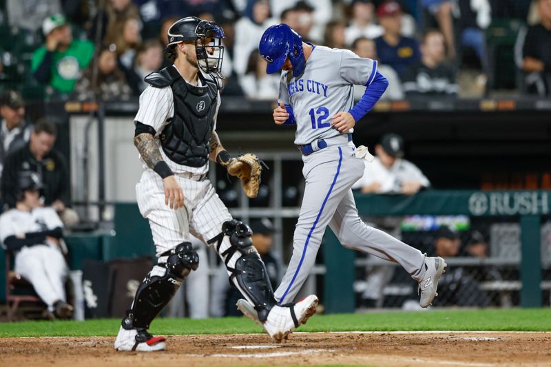 Sep 13, 2023; Chicago, Illinois, USA; Kansas City Royals shortstop Nick Loftin (12) scores against the Chicago White Sox during the seventh inning at Guaranteed Rate Field. Mandatory Credit: Kamil Krzaczynski-USA TODAY Sports