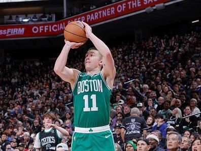 SACRAMENTO, CA - DECEMBER 20:  Payton Pritchard #11 of the Boston Celtics shoots a three point basket during the game  on December 20, 2023 at Golden 1 Center in Sacramento, California. NOTE TO USER: User expressly acknowledges and agrees that, by downloading and or using this Photograph, user is consenting to the terms and conditions of the Getty Images License Agreement. Mandatory Copyright Notice: Copyright 2023 NBAE (Photo by Rocky Widner/NBAE via Getty Images)