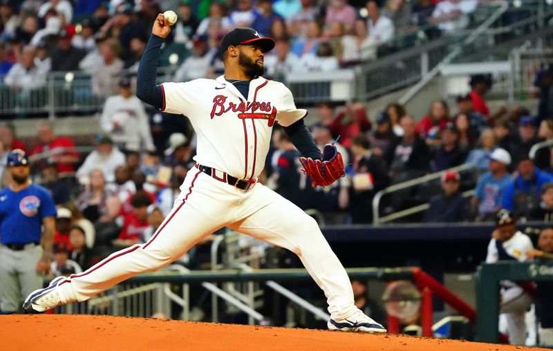 May 13, 2024; Cumberland, Georgia, USA; Atlanta Braves pitcher Reynaldo Lopez (40) cycles through a pitch against the Chicago Cubs during the third inning at Truist Park. Mandatory Credit: John David Mercer-USA TODAY Sports