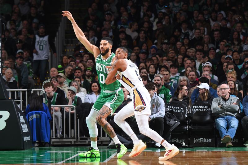 BOSTON, MA - JANUARY 12: Jayson Tatum #0 of the Boston Celtics and Dejounte Murray #5 of the New Orleans Pelicans battle for position during the game on January 12, 2025 at TD Garden in Boston, Massachusetts. NOTE TO USER: User expressly acknowledges and agrees that, by downloading and/or using this Photograph, user is consenting to the terms and conditions of the Getty Images License Agreement. Mandatory Copyright Notice: Copyright 2025 NBAE (Photo by Brian Babineau/NBAE via Getty Images)