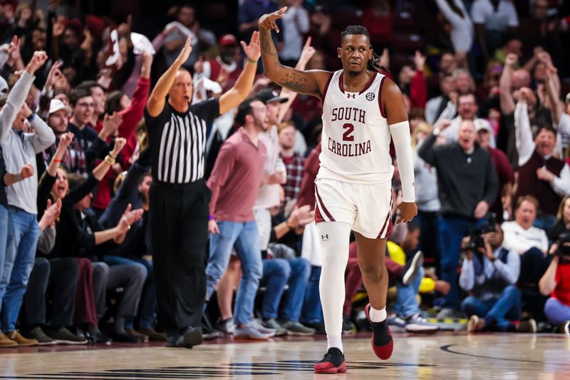 Feb 17, 2024; Columbia, South Carolina, USA; South Carolina Gamecocks forward B.J. Mack (2) celebrates a three point basket against the LSU Tigers in the second half at Colonial Life Arena. Mandatory Credit: Jeff Blake-USA TODAY Sports