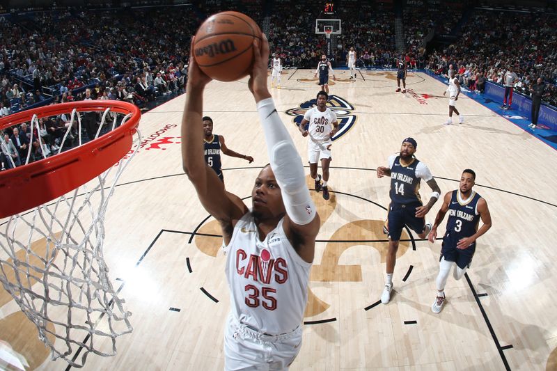 NEW ORLEANS, LA - MARCH 13: Isaac Okoro #35 of the Cleveland Cavaliers dunks the ball during the game against the New Orleans Pelicans on March 13, 2024 at the Smoothie King Center in New Orleans, Louisiana. NOTE TO USER: User expressly acknowledges and agrees that, by downloading and or using this Photograph, user is consenting to the terms and conditions of the Getty Images License Agreement. Mandatory Copyright Notice: Copyright 2024 NBAE (Photo by Layne Murdoch Jr./NBAE via Getty Images)