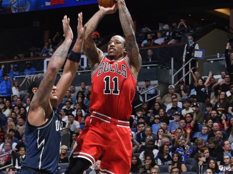 ORLANDO, FL - FEBRUARY 10: DeMar DeRozan #11 of the Chicago Bulls shoots the ball during the game against the Orlando Magic on February 10, 2024 at the Kia Center in Orlando, Florida. NOTE TO USER: User expressly acknowledges and agrees that, by downloading and or using this photograph, User is consenting to the terms and conditions of the Getty Images License Agreement. Mandatory Copyright Notice: Copyright 2024 NBAE (Photo by Gary Bassing/NBAE via Getty Images)