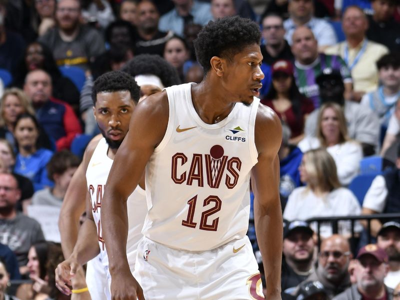 ORLANDO, FL - FEBRUARY 25:   De'Andre Hunter #12 of the Cleveland Cavaliers looks on during the game against the Orlando Magic on February 25, 2025 at Kia Center in Orlando, Florida. NOTE TO USER: User expressly acknowledges and agrees that, by downloading and or using this photograph, User is consenting to the terms and conditions of the Getty Images License Agreement. Mandatory Copyright Notice: Copyright 2025 NBAE (Photo by Fernando Medina/NBAE via Getty Images)