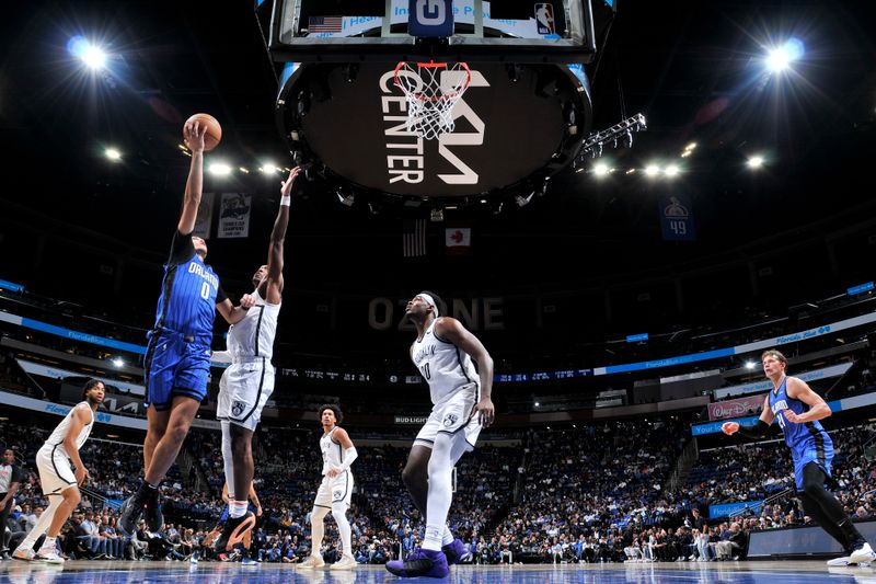 ORLANDO, FL - FEBRUARY 27: Anthony Black #0 of the Orlando Magic drives to the basket during the game against the Brooklyn Nets on February 27, 2024 at the Kia Center in Orlando, Florida. NOTE TO USER: User expressly acknowledges and agrees that, by downloading and or using this photograph, User is consenting to the terms and conditions of the Getty Images License Agreement. Mandatory Copyright Notice: Copyright 2024 NBAE (Photo by Fernando Medina/NBAE via Getty Images)