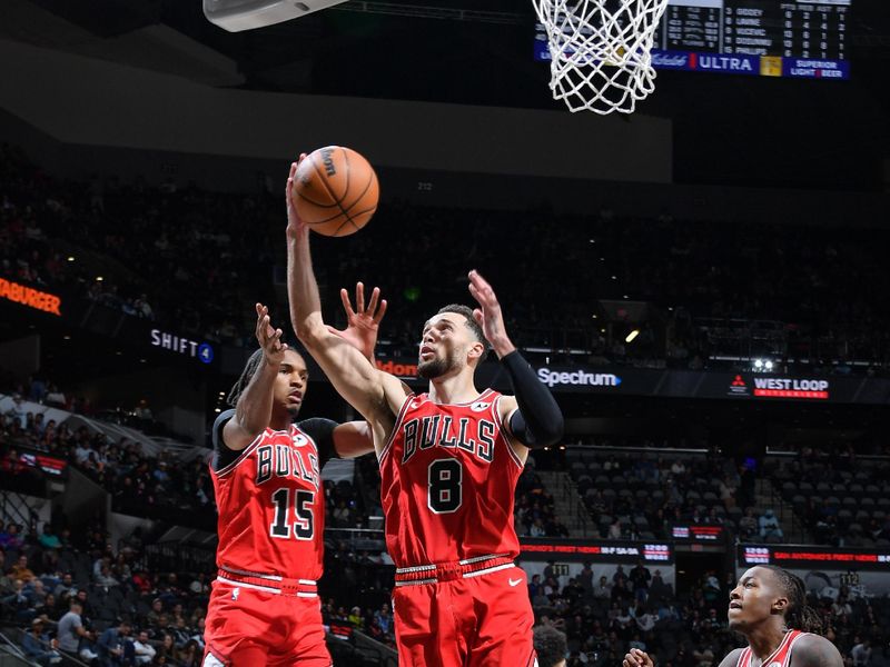 SAN ANTONIO, TX - DECEMBER 5: Zach LaVine #8 of the Chicago Bulls goes up for the rebound during the game against the San Antonio Spurs on December 5, 2024 at the Frost Bank Center in San Antonio, Texas. NOTE TO USER: User expressly acknowledges and agrees that, by downloading and or using this photograph, user is consenting to the terms and conditions of the Getty Images License Agreement. Mandatory Copyright Notice: Copyright 2024 NBAE (Photos by Michael Gonzales/NBAE via Getty Images)