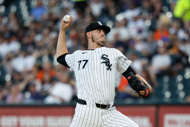 Aug 23, 2024; Chicago, Illinois, USA; Chicago White Sox starting pitcher Chris Flexen (77) delivers a pitch against the Detroit Tigers during the first inning at Guaranteed Rate Field. Mandatory Credit: Kamil Krzaczynski-USA TODAY Sports