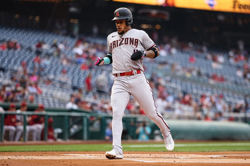 Jun 7, 2023; Washington, District of Columbia, USA; Arizona Diamondbacks second baseman Ketel Marte (4) scores a run against the Washington Nationals during the first inning at Nationals Park. Mandatory Credit: Scott Taetsch-USA TODAY Sports