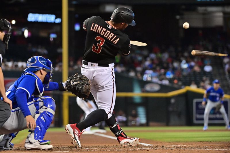 Apr 26, 2023; Phoenix, Arizona, USA; Arizona Diamondbacks third baseman Evan Longoria (3) hits an RBI single in the fourth inning against the Kansas City Royals at Chase Field. Mandatory Credit: Matt Kartozian-USA TODAY Sports