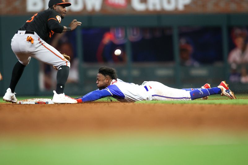 May 6, 2023; Atlanta, Georgia, USA; Atlanta Braves second baseman Ozzie Albies (1) steals second base against the Baltimore Orioles in the eighth inning at Truist Park. Mandatory Credit: Brett Davis-USA TODAY Sports
