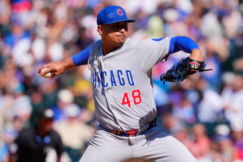 Aug 31, 2025; Denver, Colorado, USA; Chicago Cubs relief pitcher Daniel Palencia (48) delivers a pitch in the ninth inning against the Colorado Rockies at Coors Field. Mandatory Credit: Ron Chenoy-Imagn Images