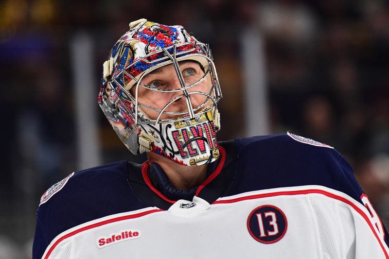 Nov 18, 2024; Boston, Massachusetts, USA;  Columbus Blue Jackets goaltender Elvis Merzlikins (90) during the first period against the Boston Bruins at TD Garden. Mandatory Credit: Bob DeChiara-Imagn Images