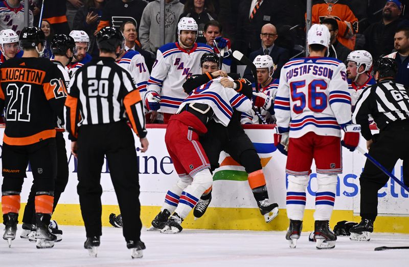 Nov 24, 2023; Philadelphia, Pennsylvania, USA; Philadelphia Flyers right wing Garnet Hathaway (19) and New York Rangers left wing Will Cuylle (50) fight in the first period at Wells Fargo Center. Mandatory Credit: Kyle Ross-USA TODAY Sports